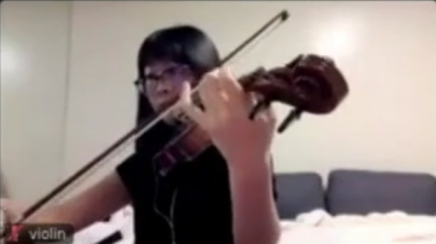 Stanford orchestra member using Jacktrip and recorded on Zoom